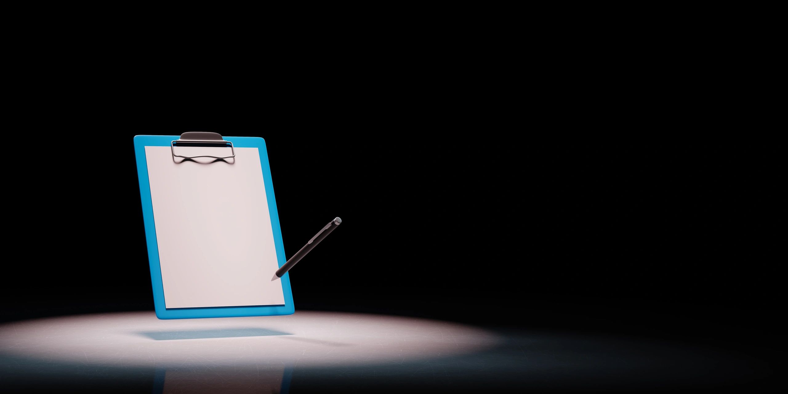 Clipboard and pen on dark background representing documentation and compliance