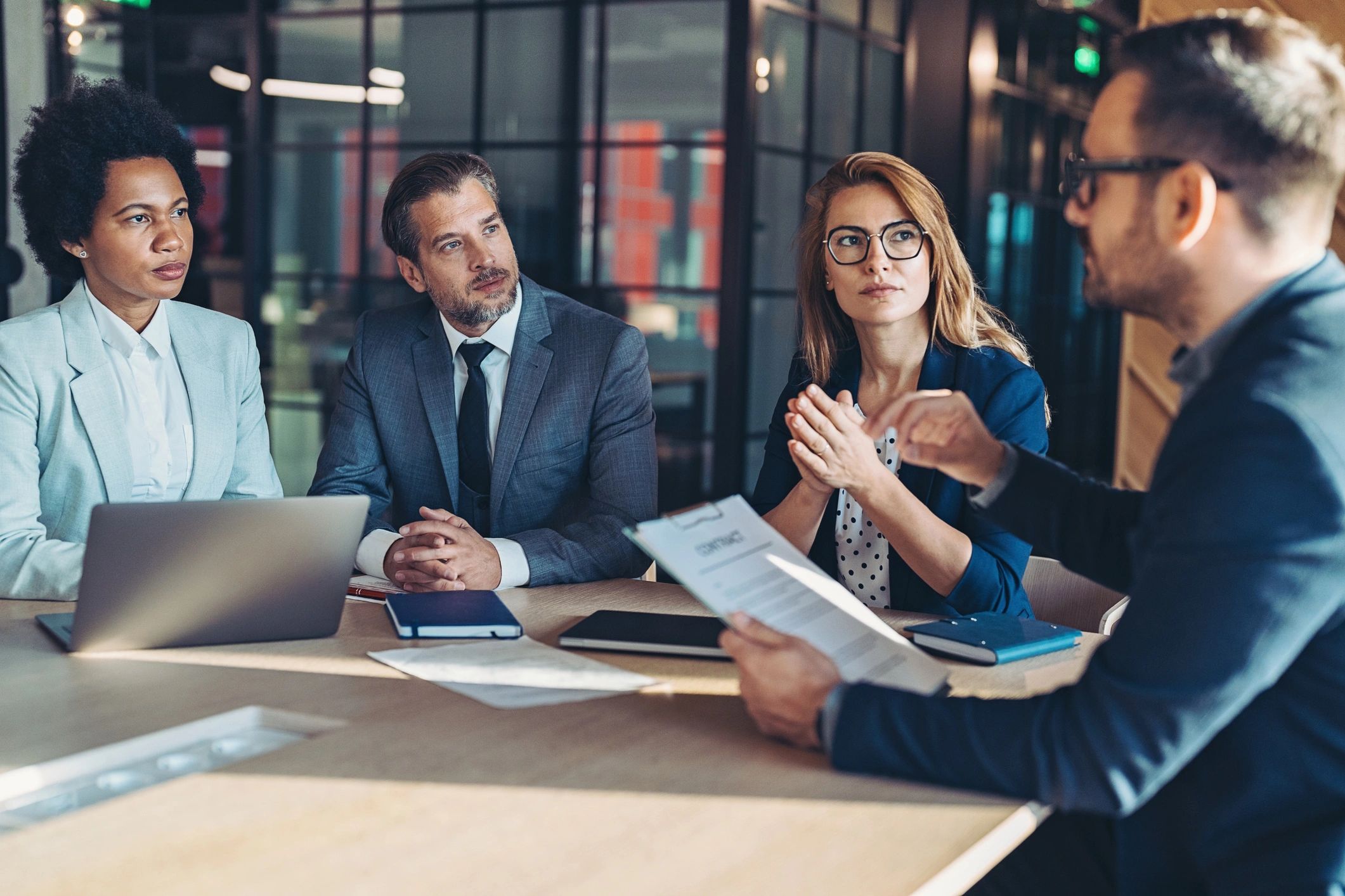 Business professional presenting during a meeting
