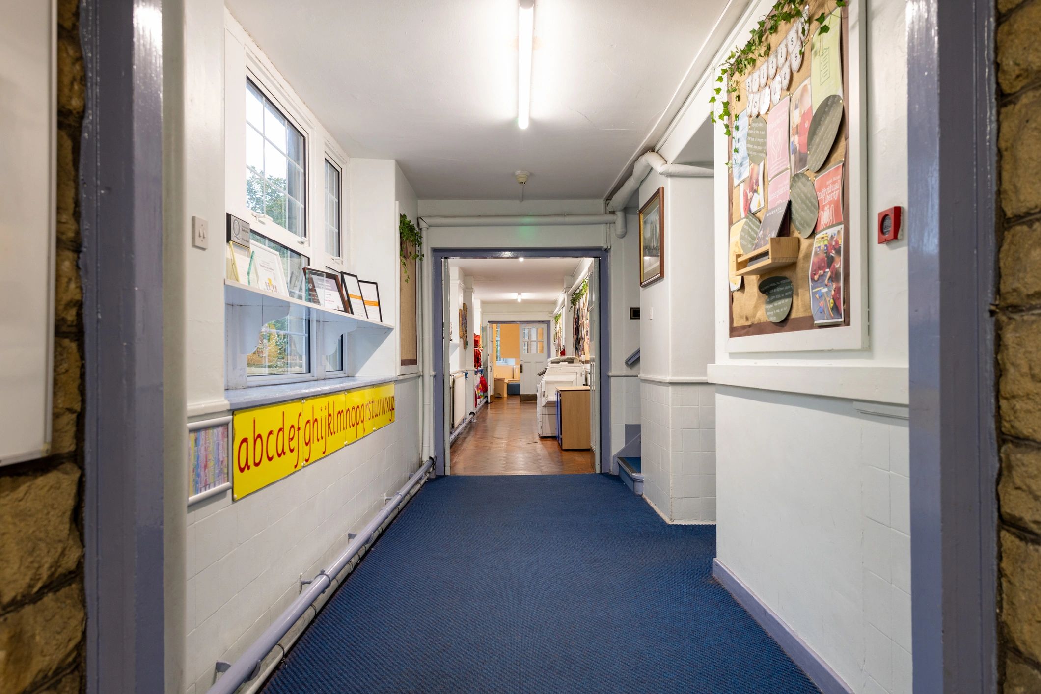 Commercial corridor interior for fire safety and detection context
