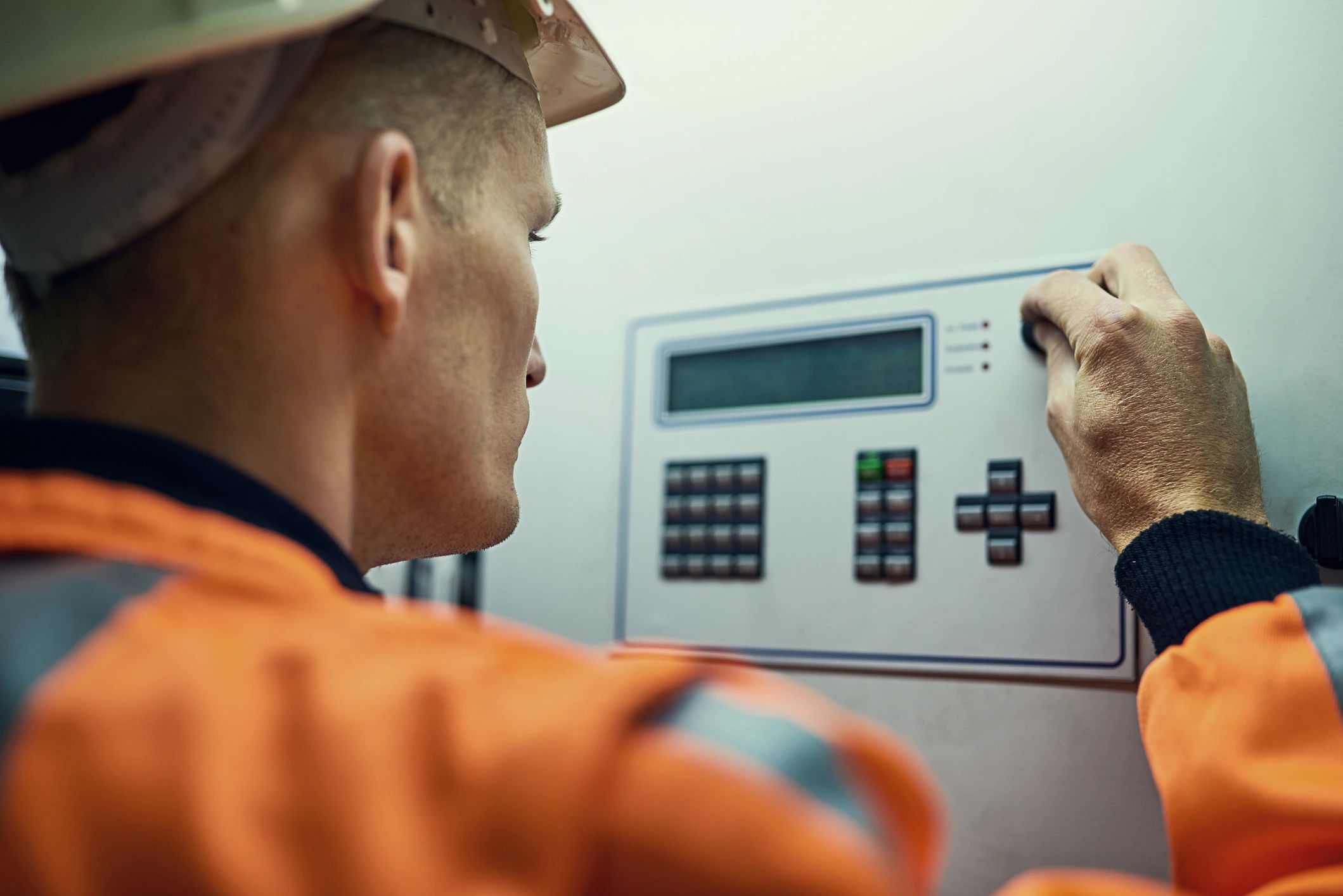 Technician working with industrial equipment